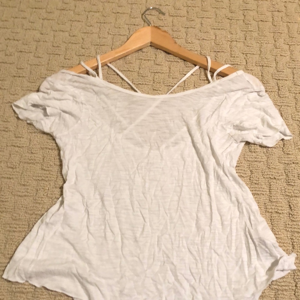 white short sleeve top with strappy back